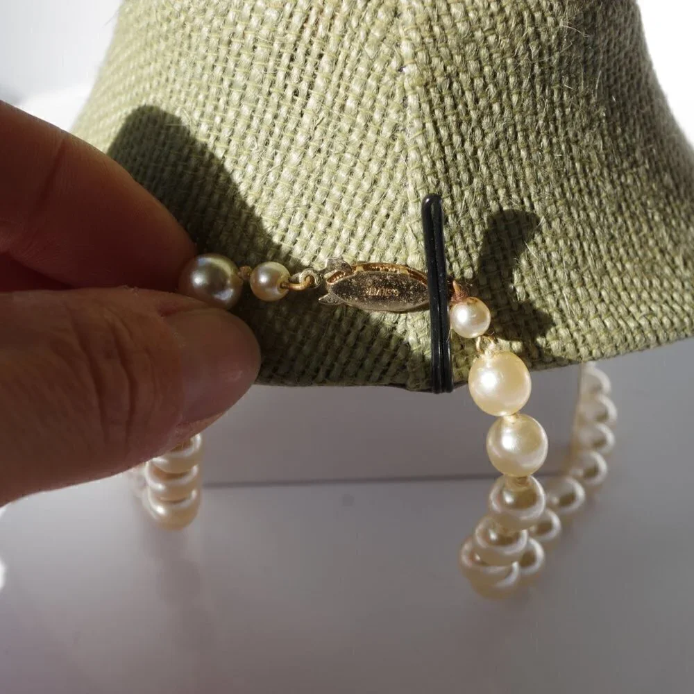Women`s white faux pearl gold tone marked g.silver